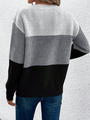 Colorblock ribbed knit sweater with boatneck in light gray, dark gray, and black.