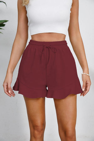 Wine linen blend shorts with drawstring waist and flounce hem detail
