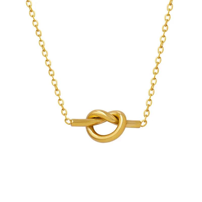 Gold knot pendant necklace with a delicate chain, 18K gold-plated.