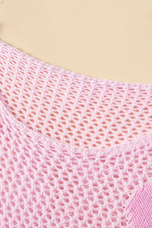 Blush pink openwork knit sweater with a crew neck and intricate floral intarsia detail.