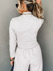 Light gray turtleneck loungewear set with drawstring pants and long sleeves