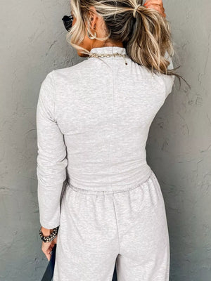 Light gray turtleneck loungewear set with drawstring pants and long sleeves