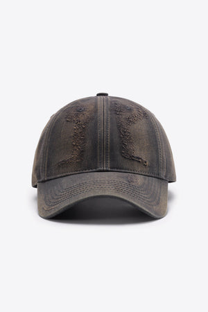 Distressed baseball cap in a washed brown color with frayed details.