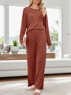 Ribbed knit lounge set in Terracotta with long sleeves, crew neck, chest pocket, and wide-leg pants.