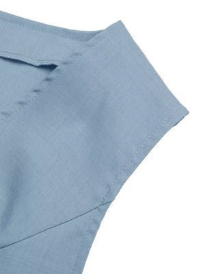 Chic blue buttoned vest detail with tailored collar and stitching.