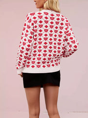 White and red argyle knit sweater with heart details, crew neck, long sleeves.