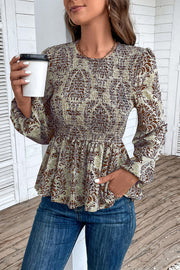 Brown damask print peplum blouse with smocking and puff sleeves