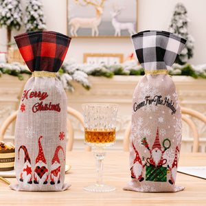 Gnome wine bottle covers in red/black buffalo plaid and tan with gnomes and holiday text.