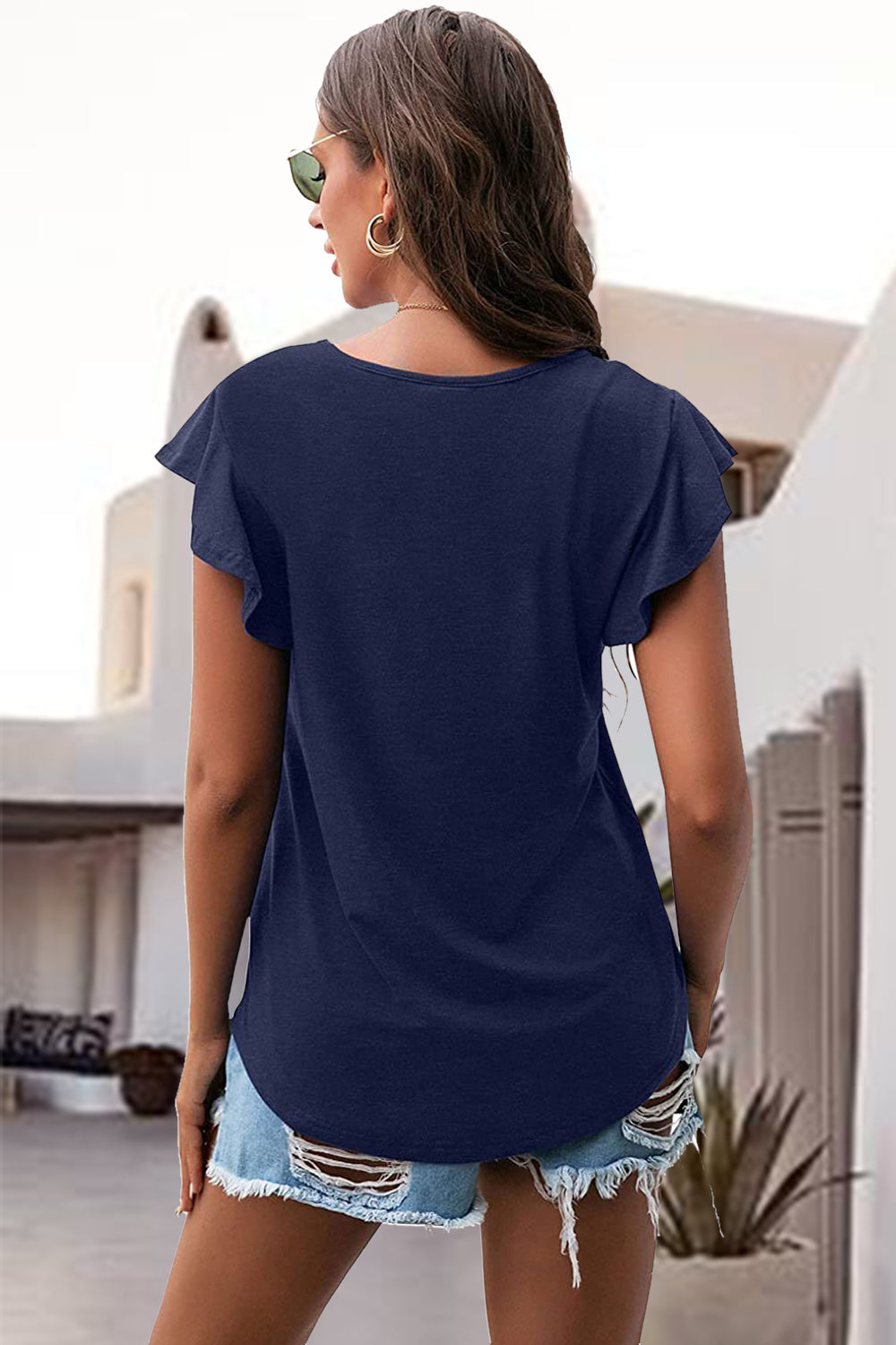 Dark Blue ruffled sleeve tee with scoop neck and curved hem.
