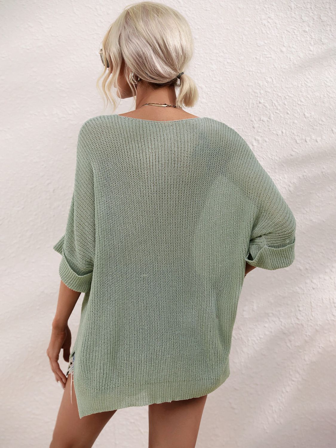 Sage relaxed knit tunic top with boat neck and cuffed sleeves.