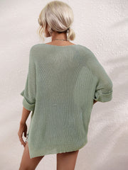 Sage relaxed knit tunic top with boat neck and cuffed sleeves.