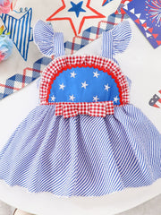 Patriotic baby dress with blue stripes, white stars, red gingham trim, and bow.