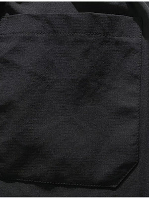Black cargo capris with a patch pocket and visible stitching detail.