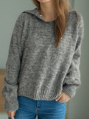 Textured knit polo sweater in dark gray with ribbed cuffs and hem.