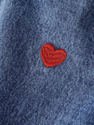 Embroidered Heart Wide-leg Jeans, close-up detail