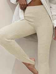 Cream ribbed knit stirrup leggings with a high waist.