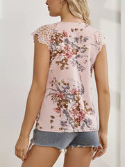 Pink floral shirt with lace cap sleeves and cutout detail