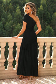 Black asymmetric ruched maxi dress with one-shoulder neckline and flowing skirt.