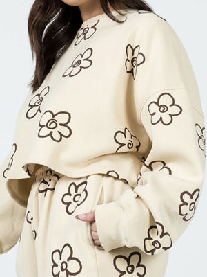 Ivory cropped sweatshirt and lounge pants set with a brown drawn floral print.