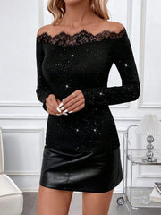 Black sparkle off-shoulder blouse with lace trim and long sleeves.