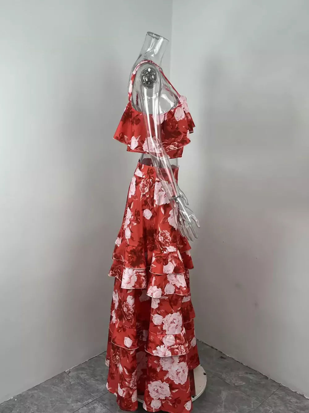 Ruffled floral two-piece set in strawberry red with tiered skirt and ruffled crop top.