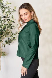 Green faux leather biker jacket with a stand-up collar and zip detail.