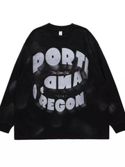 Black oversized long-sleeve t-shirt with bold white "PORTLAND OREGON" graphic and "The Rose City" text.