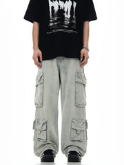 Relaxed fit light blue denim cargo trousers with multiple pockets.