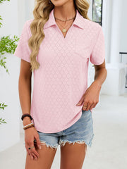 Blush pink eyelet polo collar blouse with short sleeves and a chest pocket.