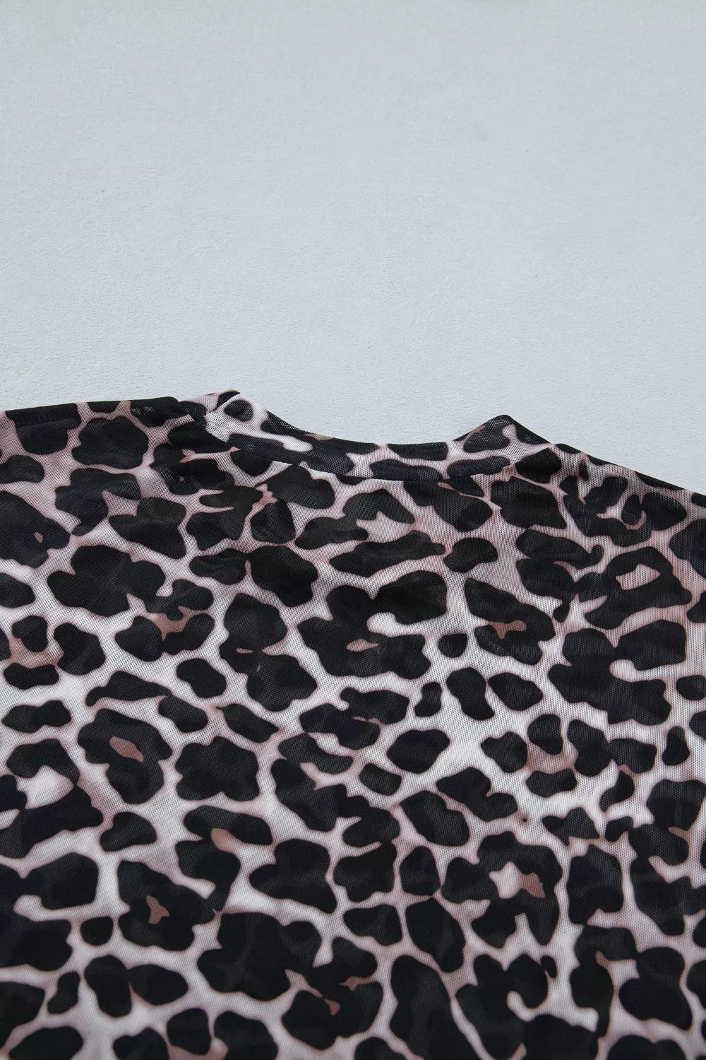 Sheer mesh t-shirt with leopard print and crew neck.
