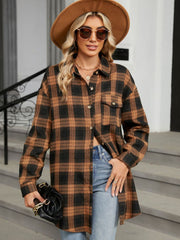 Oversized brown and black plaid shacket with button front and chest pockets.