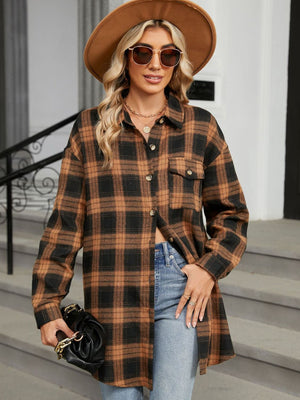 Oversized brown and black plaid shacket with button front and chest pockets.