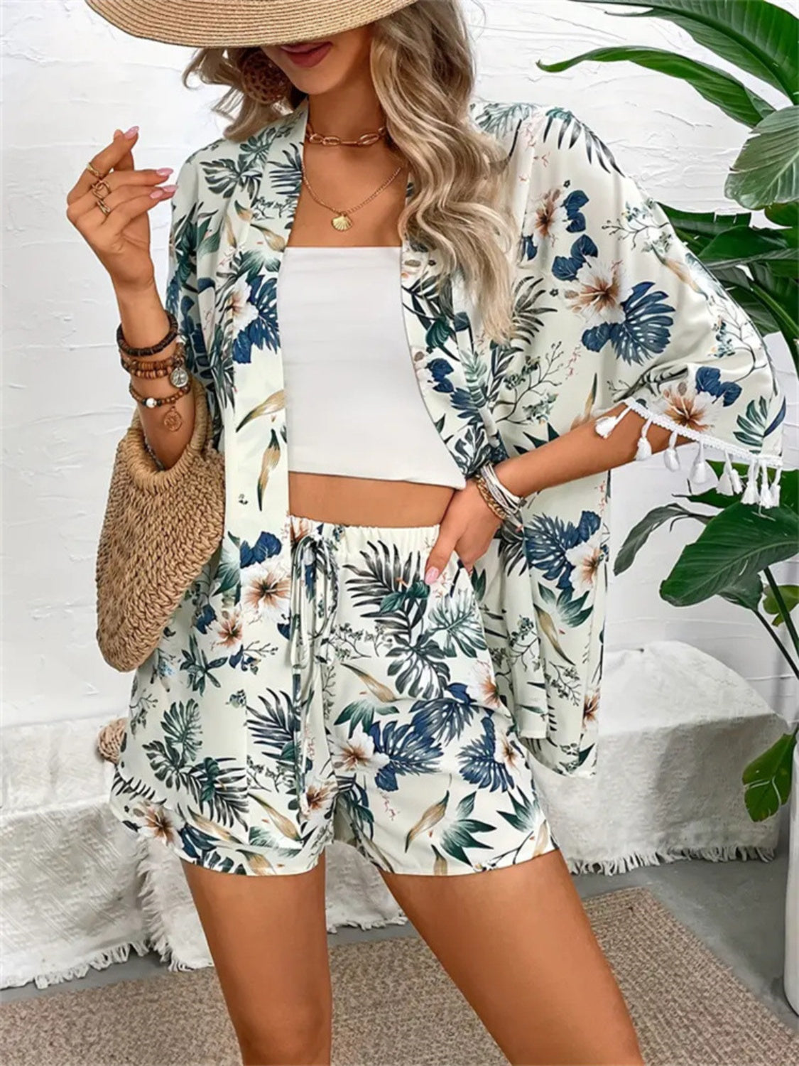 Light green botanical print kimono and shorts set with tassel trim, styled with a white crop top.