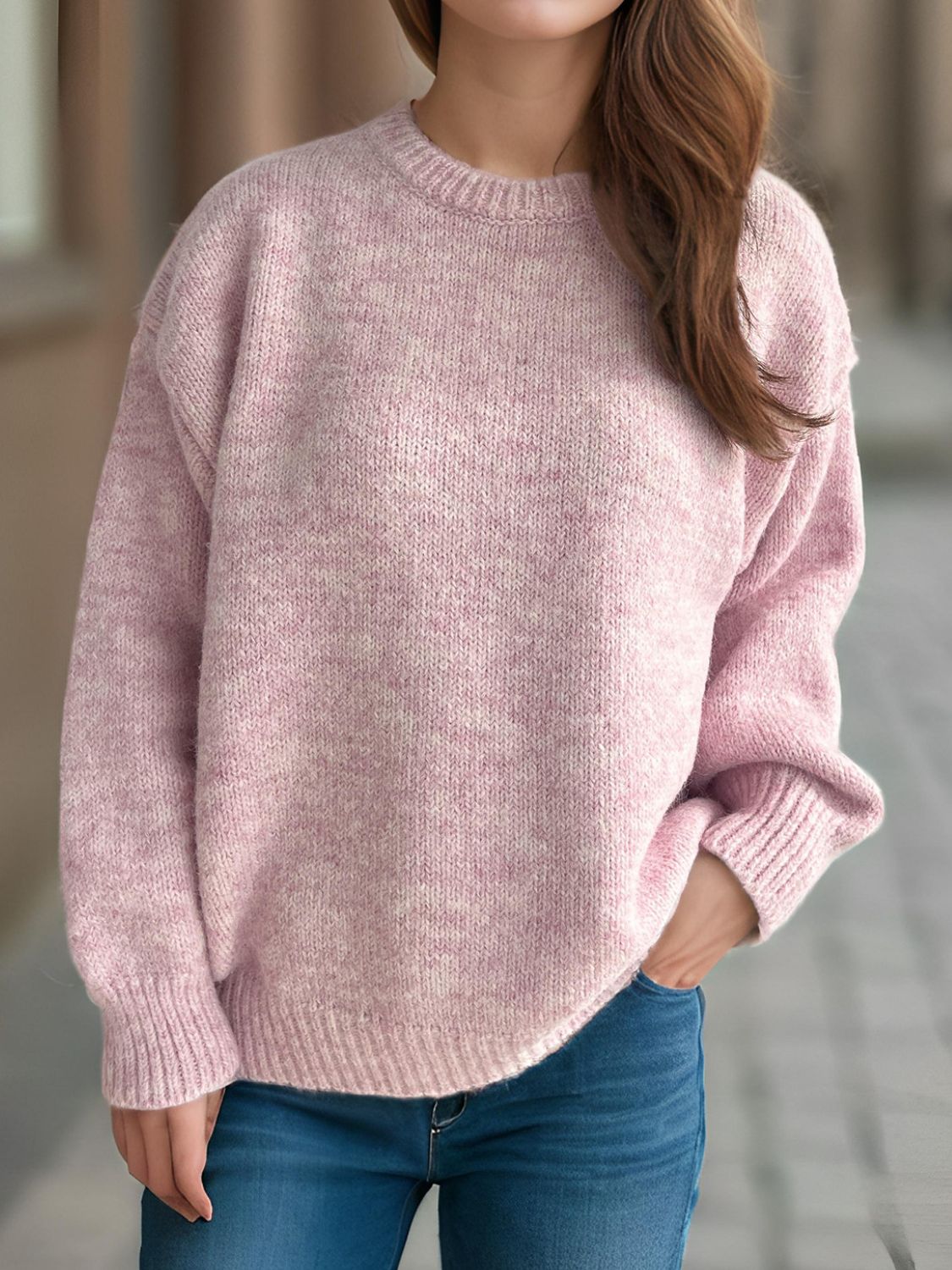 Oversized crewneck sweater in dusty pink textured knit with ribbed cuffs and hem.