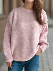 Oversized crewneck sweater in dusty pink textured knit with ribbed cuffs and hem.