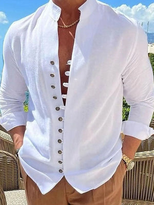 White linen shirt with mandarin collar and button placket, long sleeves.