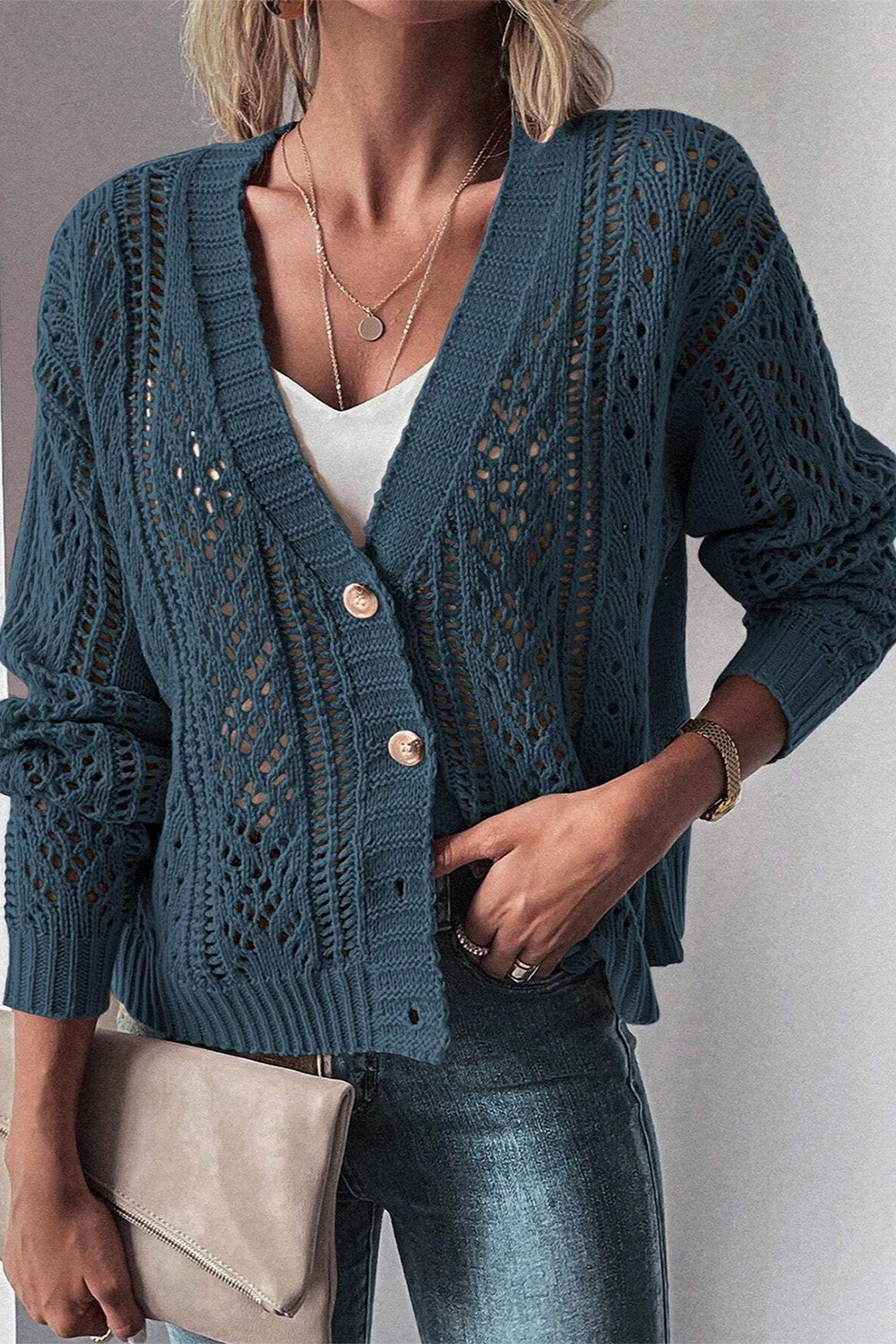 Peacock blue knit cardigan with mesh detail and button front