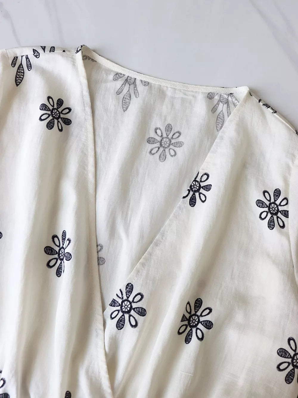 Printed Surplice Half Sleeve Romper in White, back view
