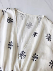 Printed Surplice Half Sleeve Romper in White, back view