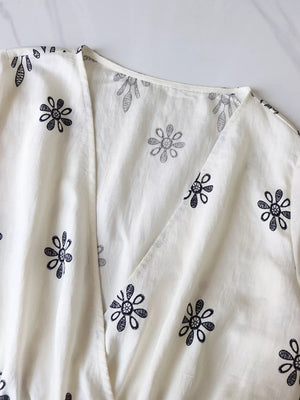 Printed Surplice Half Sleeve Romper in White, back view