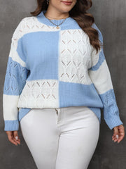 Light blue and white geometric openwork patchwork knit sweater with crewneck and long sleeves.