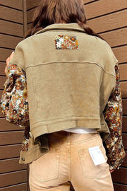 Khaki waffle knit jacket with floral print sleeves and back panel detail.