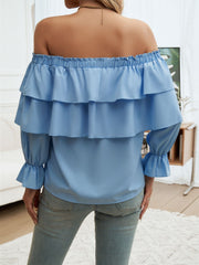 Cerulean tiered ruffle off-shoulder blouse with elastic neckline and bell sleeves.