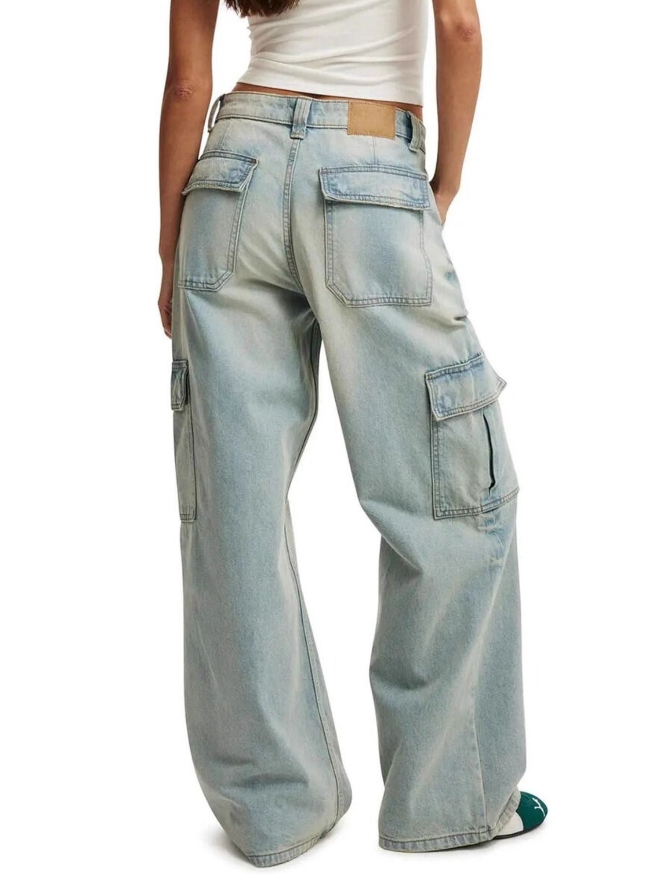 Light blue wide leg cargo jeans in cotton denim with multiple pockets.