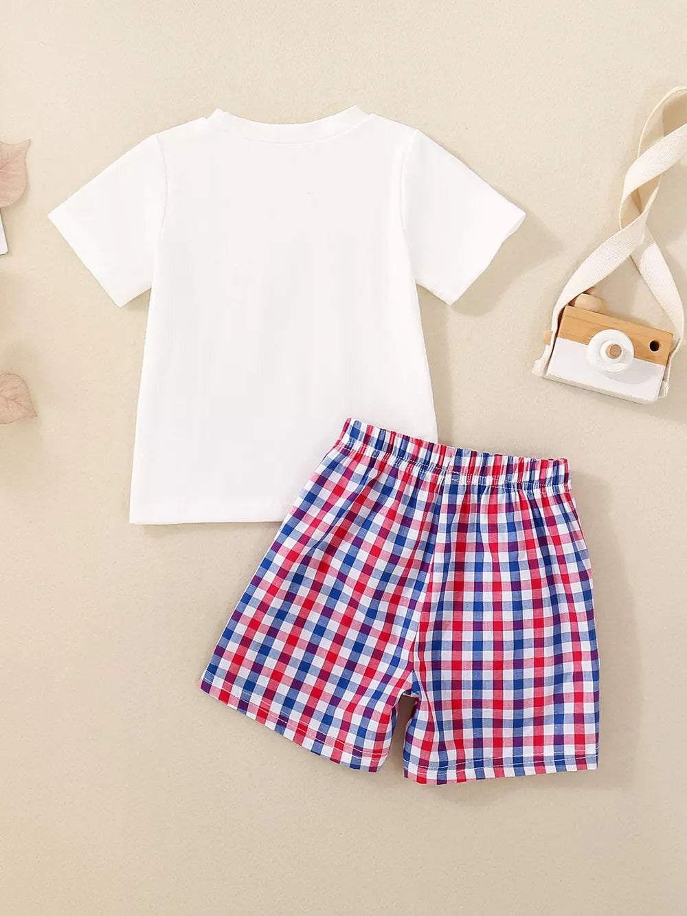 Baby girls' white smocked tee and red & blue plaid shorts set, cotton.