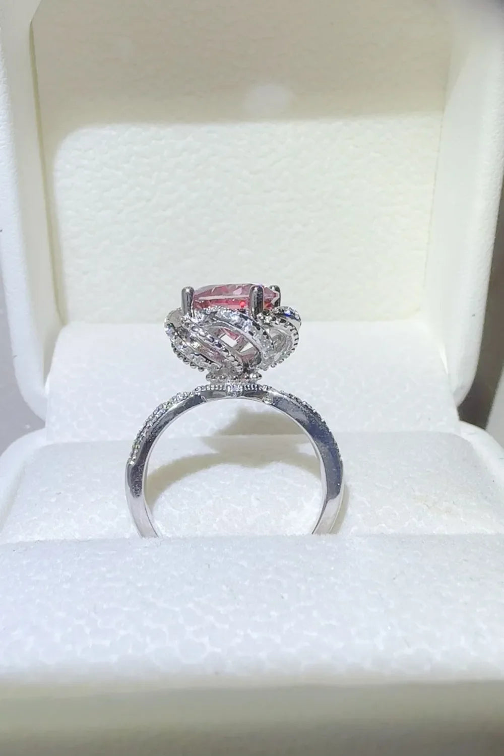 Crimson Bloom Moissanite Halo Ring in cerise with a diamond-accented band.