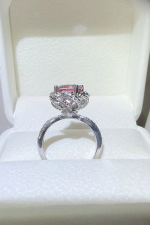 Crimson Bloom Moissanite Halo Ring in cerise with a diamond-accented band.