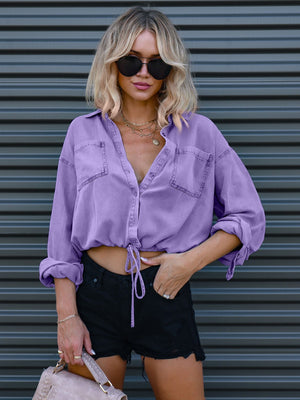 Lavender cotton cropped utility shirt with drawstring waist and button front.
