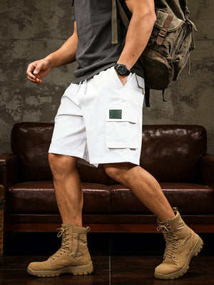 White cargo shorts with drawstring and patch pocket detail.
