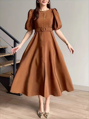 Belted midi dress in brown with puff sleeves and a-line skirt